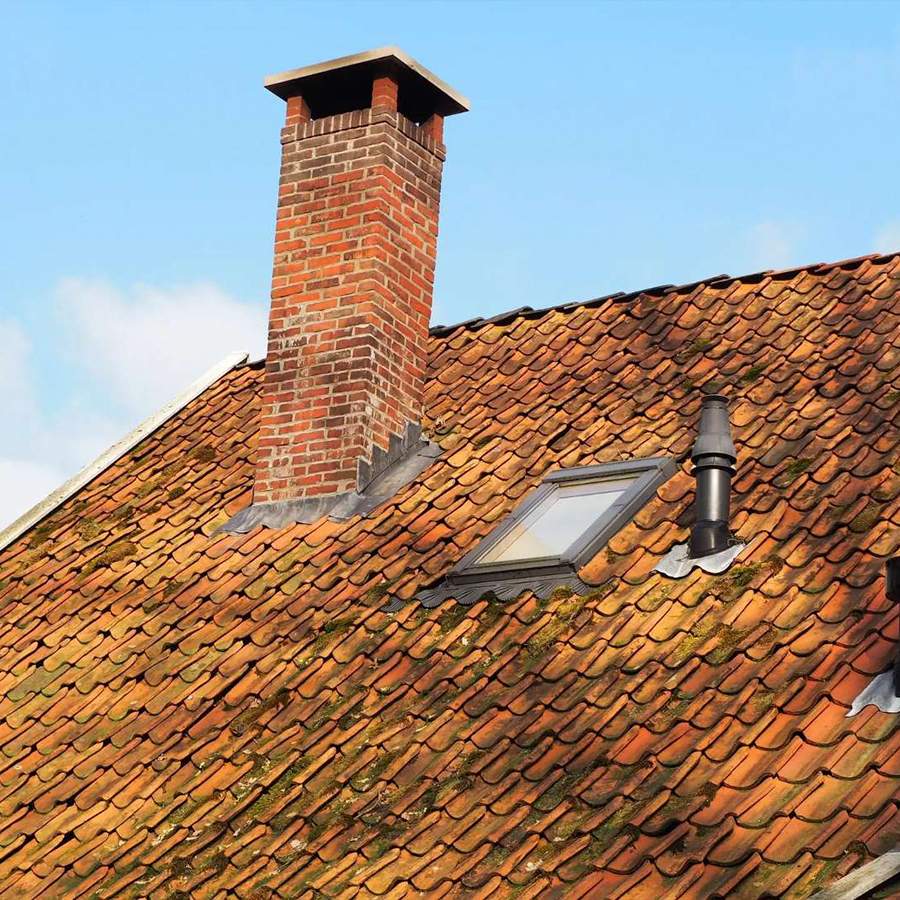 a roof with a chimney and a chimney