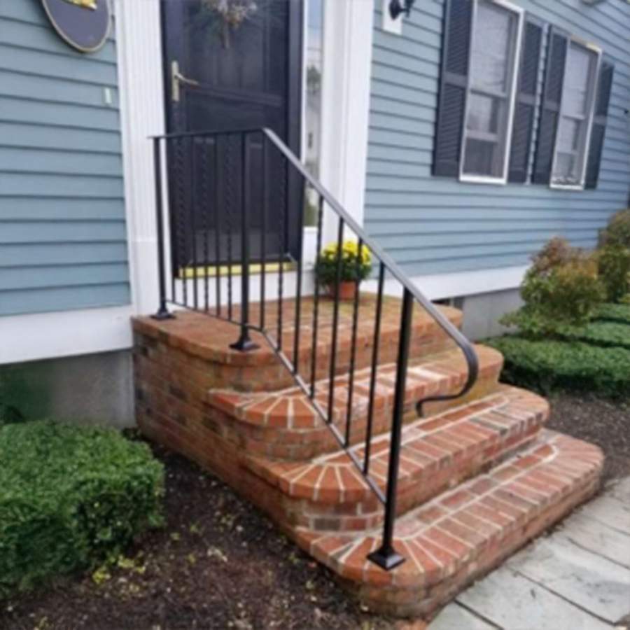 a brick stairs outside a house
